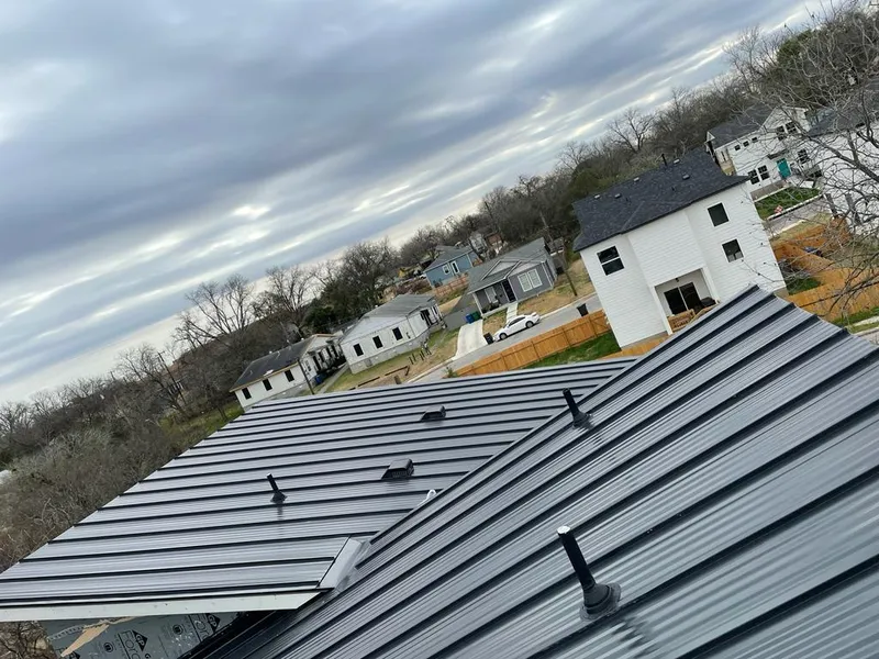 Standing seam metal roof panels with vents for Skylight Repair in Fowler